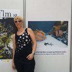 Posando con el cartel oficial de la Feria.